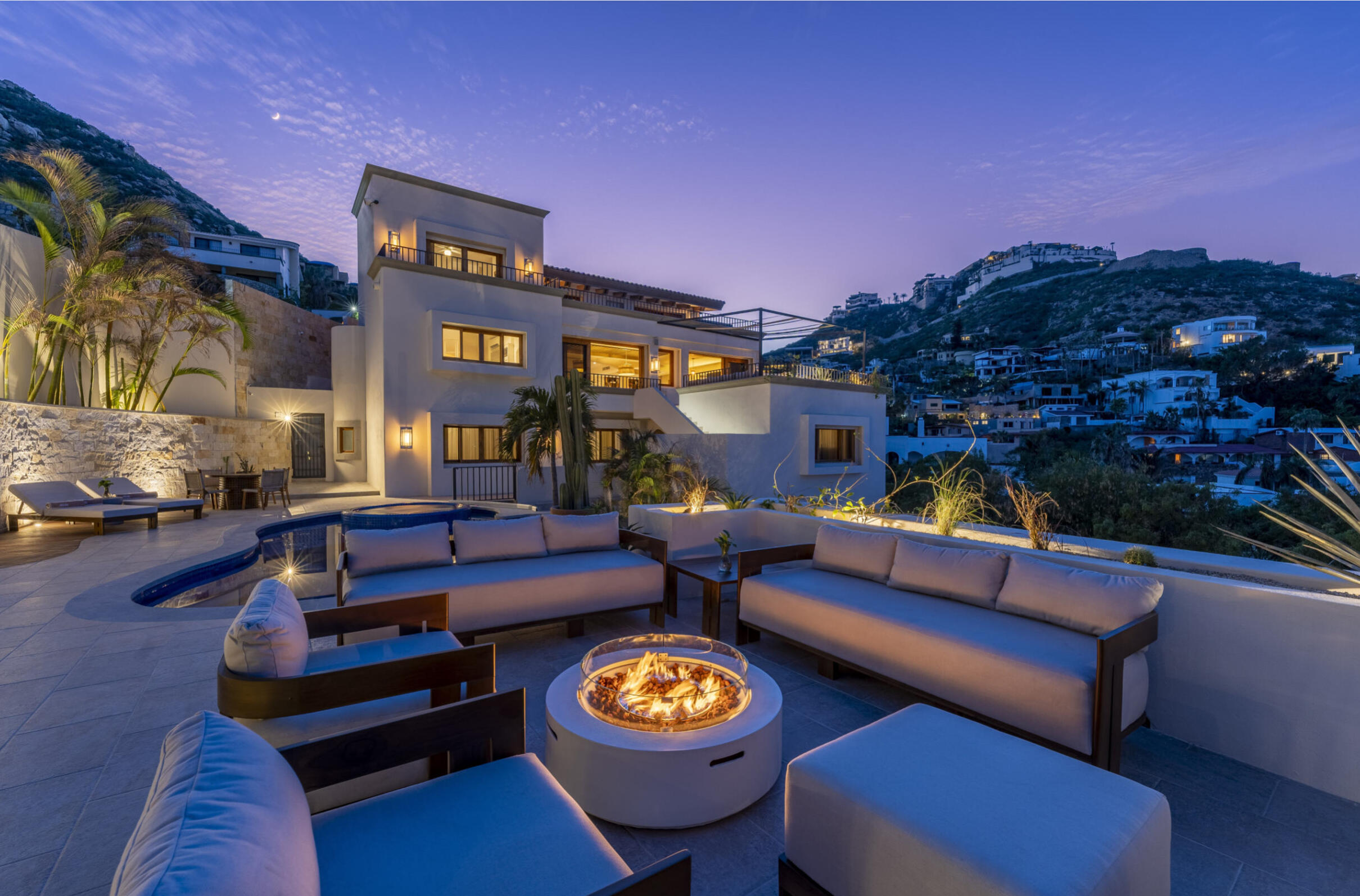Cabo Luxury Las Terrazas Set along the 15th hole of the El Cardonal Golf Course, panoramic vistas extend from rolling fairways to the Pacific, delivering striking sunrises and sunsets.This four-bedroom, 4.5-bath home blends refined design with seamless indoor-outdoor living. Open-concept interiors feature Palecek furnishings, while each bathroom showcases hand-painted Mexican tile for warmth and authenticity.Outdoor living includes a private pool and elevated hot tub, outdoor grill and wet bar, lush landscaping, and expansive terraces with golf course and ocean for sale