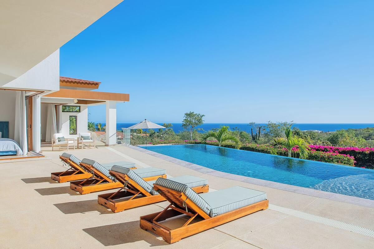 Cabo Luxury La Noria Casa Lau'ren offers contemporary luxury with 4 bedrooms plus a private casita. Overlooking the Jack Nicklaus Signature Golf Course, this elegant home features ocean for sale
