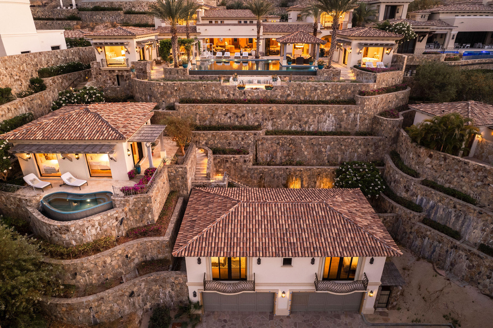Cabo Luxury Sunset Hill Setting a new benchmark for modern design at Diamante, this truly exceptional five-bedroom, five-bathroom residence embodies the pinnacle of contemporary luxury. With an elevated aesthetic, the home utilizes state-of-the-art 3D foam panel construction to ensure remarkable environmental comfort, structural durability, and minimal long-term maintenance. Outfitted with a professional-grade suite of Wolf, Sub-Zero, and Zephyr appliances, the interior is a fully realized, turn-key masterpiece offering immediate access to the exclusive Diamante lifestyle. The open-concept living spaces are defined by a seamless indoor-outdoor flow, drawing the eye toward breathtaking sunset for sale