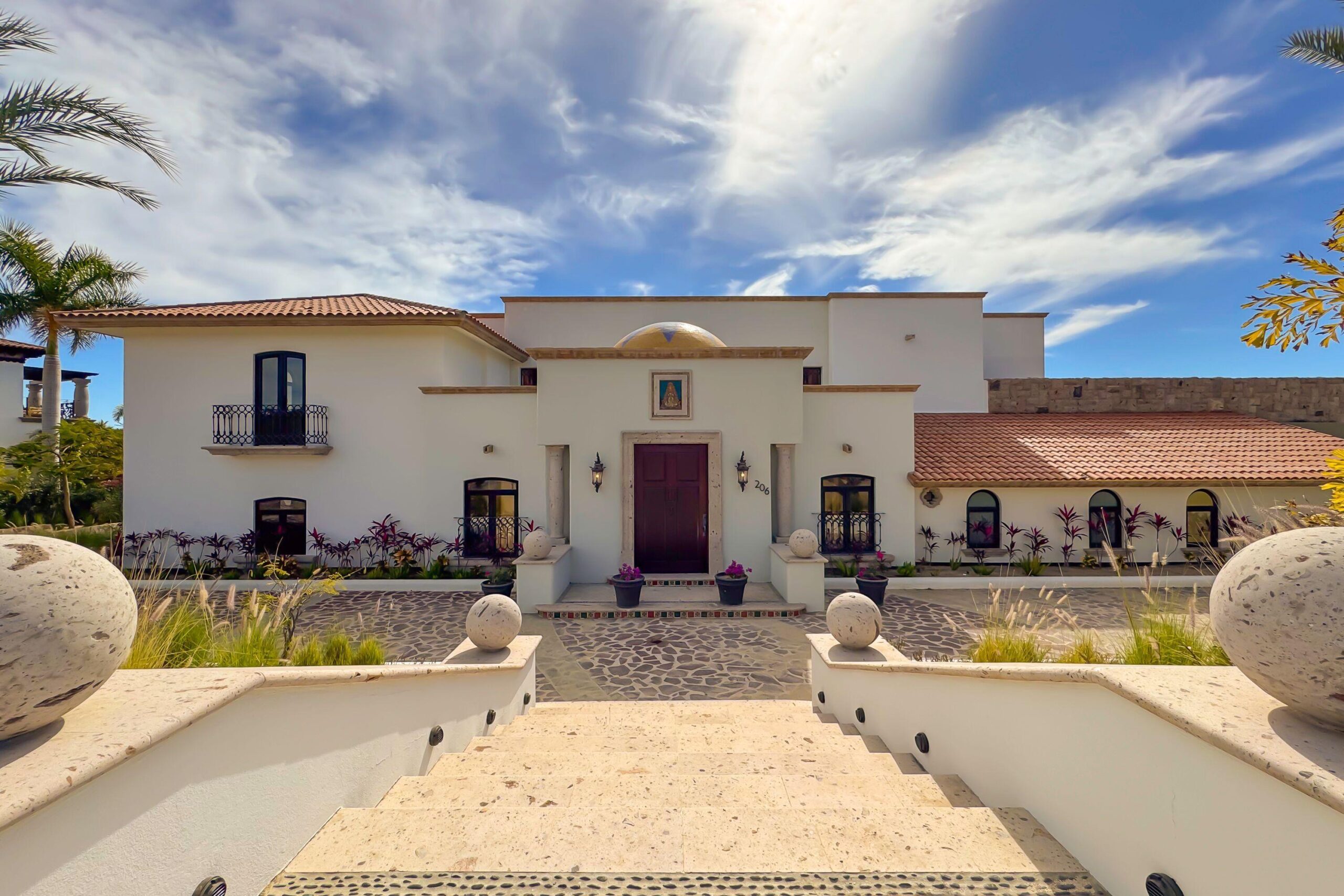Cabo Luxury Section 1- Las Colinas Casa Sueรฑos is an extraordinary 10-bedroom estate, thoughtfully designed to embrace large-scale living within Querencia.The property welcomes you into the main house and is composed of a separate casita located just steps away, together functioning as one unified residence. The main house features expansive indoor and outdoor living areas, seven spacious bedrooms, outdoor showers, a generous pool terrace, and unobstructed for sale