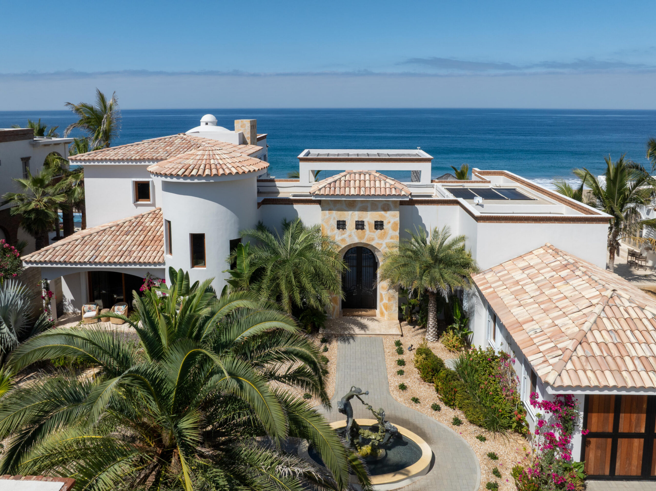 Cabo Luxury Rancho Nuevo This is a one of a kind estate property consisting of two oceanfront homes. The oceanfront estate with 3 grand bedrooms/4.5 baths, interior/exterior living, 2 kitchens, 2 dining areas, butler's pantry, 2 laundry rooms, and attached garage. Two primary suites are situated upstairs and downstairs.. No expense was spared in exquisite high end finish out such a brick bovedas, brick barrel kitchen ceiling, Heston appliances.Onyx countertops with hidden electrical outlets. This estate was built with the highest quality of materials and design. Dual pane hurricane doors and windows plus hurricane shutters encompassing even the covered patio. The orientation is perfectly situated to capture the Pacific, which sits on 3000m2 lot, walled with electronic gated car gate located high on a bluff. See mo Imagine only 35 minutes from Cabo San Lucas and 15 minutes from Todos Santos, lies the oceanfront gated community known as Rancho Nuevo. This one of a kind estate property consists of an oceanfront home with 3 oversized suites all with luxurious en suite bathrooms, walk-in closets, of which two are oceanfront. The upstairs primary has two terraces, one with built in seating compete with a fire pit. The home was constructed with the highest quality materials and orientation to take in the ocean for sale