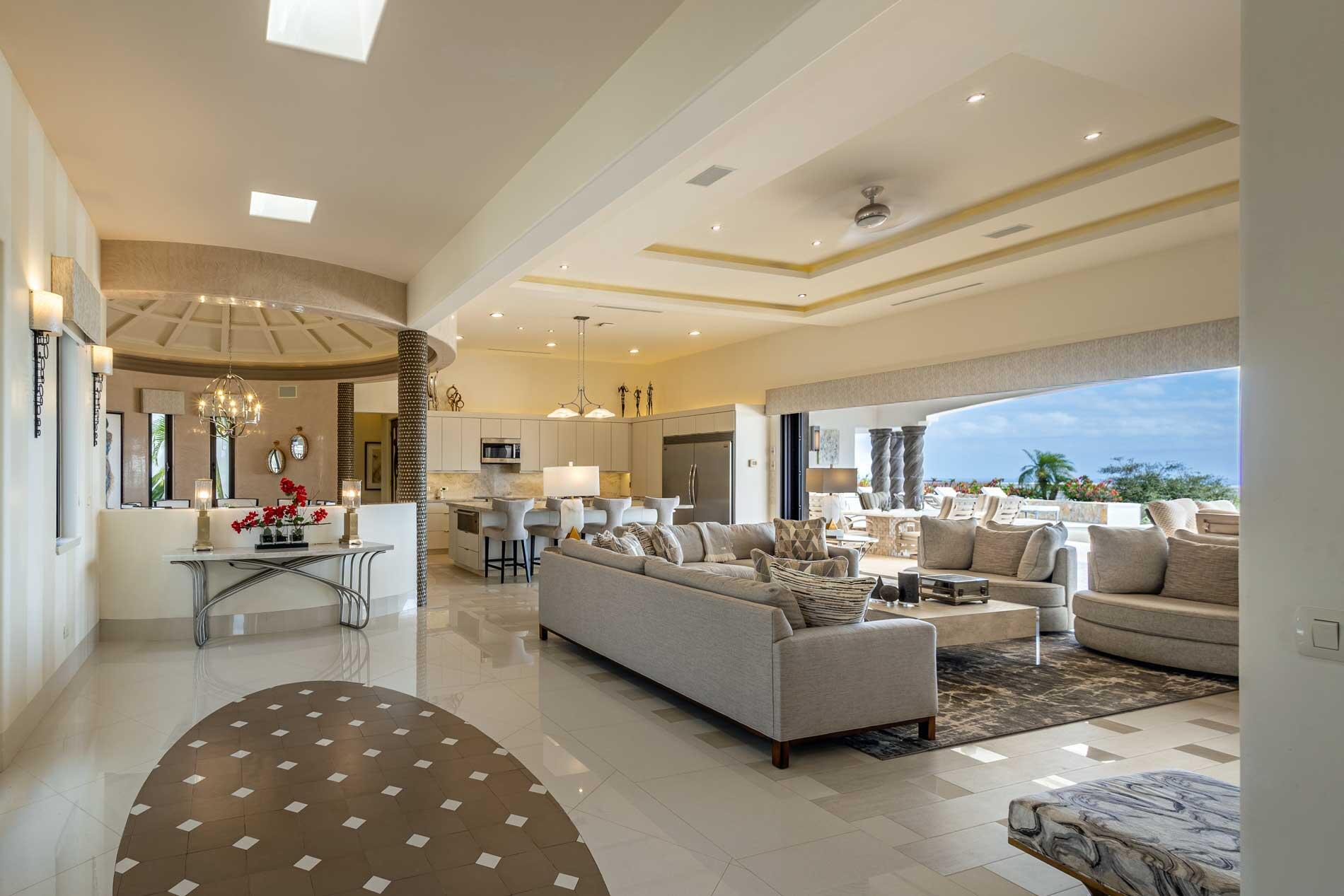 Cabo Luxury Section 4- Las Canadas Discover refined indoor-outdoor living at Cañada 9, set within Querencia, San Jose del Cabo's premier private golf community. Soaring beamed ceilings, walls of pocket glass, and luminous marble floors define an open great room that flows effortlessly to the terrace, infinity-edge pool, and stone-clad water feature -- all framed by panoramic Sea of Cortez and mountain for sale