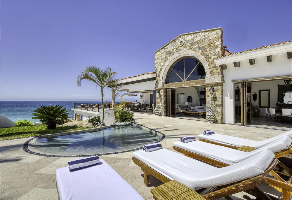 Cabo Luxury La Laguna La Laguna Beach Estate: The Definitive 8-Suite Beachfront Legacy Compound8 BR | 8.5 BA | 11,000+ Total Sq. Ft. | 16,000 Sq. Ft. Outdoor LivingOffered as a rare opportunity to acquire a generational legacy asset in an era of intentional coastal scarcity, La Laguna Beach Estate represents the pinnacle of beachfront luxury. This expansive Hacienda masterfully integrates authentic Mexican craftsmanship with the sophisticated infrastructure of a world-class private resort. Situated on a serene, semi-private beach in the prestigious La Laguna enclave of San Josรฉ del Cabo, the estate offers a sanctuary of privacy and tranquility unmatched in the San Josรฉ Corridor--reminiscent of the pristine California coastline but set against the warm, azure waters of the Sea of Cortez. A Masterclass in High-Yield LuxuryDesigned as a consolidated luxury asset, this property transcends the standard residential offering. With over 13,000 square feet of covered living space and a proven footprint for high-end wellness retreats and corporate events, the estate is optimized for both private enjoyment and boutique hospitality. Each of the 8 exquisitely appointed ocean- for sale