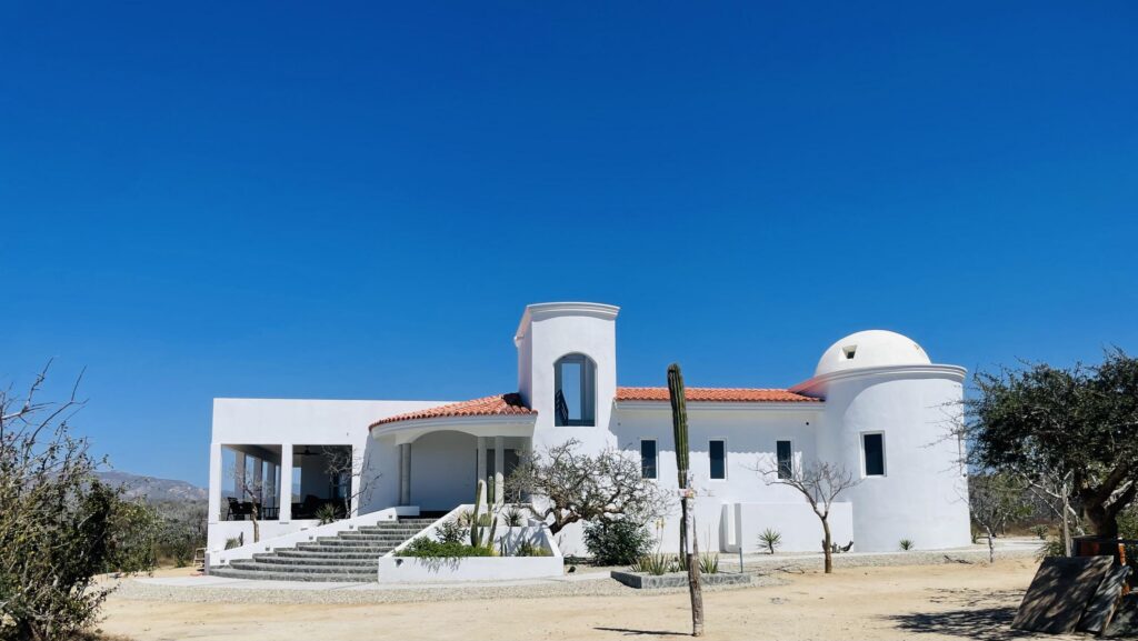 Cabo Luxury Migrino This is an estate property with full ownership.It is on a 2 1/2 acre lot and has a Main house and a Beautiful Guest house. Both are high end construction and architecturally designed for comfort and a tranquil Life Style with a total of 6311 sq ft of single story living. Just a stone throw from the beach. If you miss seeing these homes you will miss something Very Unique in a growing community on the Pacific Corridor – 35 Casa White, Cabo Colorado, San Jose Corridor, BS