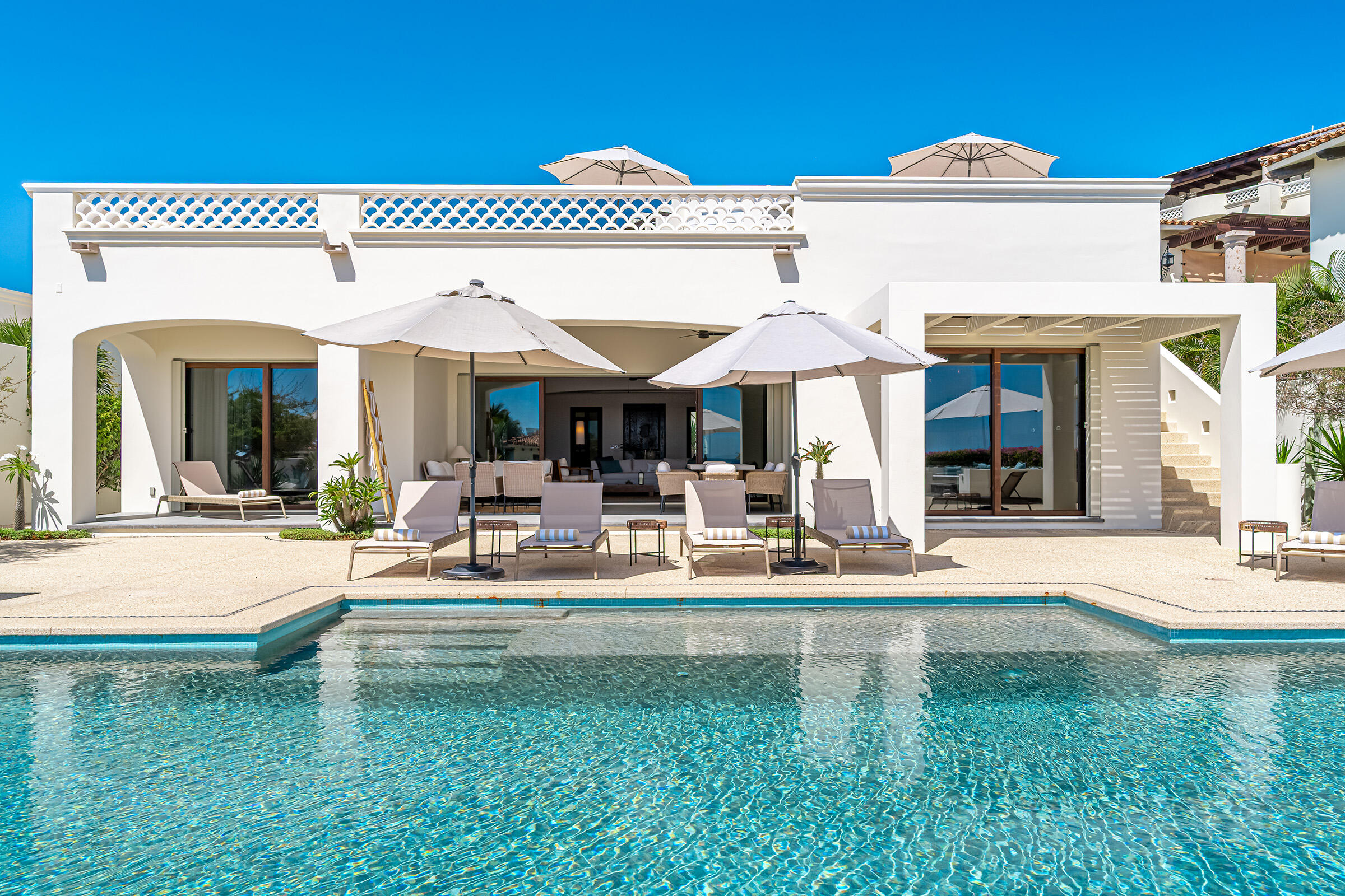 Cabo Luxury Las Terrazas Set along the 15th hole of the El Cardonal Golf Course, panoramic vistas extend from rolling fairways to the Pacific, delivering striking sunrises and sunsets.This four-bedroom, 4.5-bath home blends refined design with seamless indoor-outdoor living. Open-concept interiors feature Palecek furnishings, while each bathroom showcases hand-painted Mexican tile for warmth and authenticity.Outdoor living includes a private pool and elevated hot tub, outdoor grill and wet bar, lush landscaping, and expansive terraces with golf course and ocean for sale