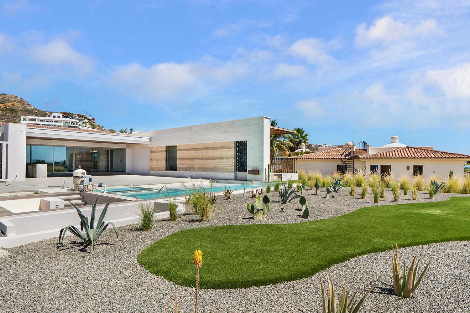 Cabo Luxury Las Terrazas Set along the 15th hole of the El Cardonal Golf Course, panoramic vistas extend from rolling fairways to the Pacific, delivering striking sunrises and sunsets.This four-bedroom, 4.5-bath home blends refined design with seamless indoor-outdoor living. Open-concept interiors feature Palecek furnishings, while each bathroom showcases hand-painted Mexican tile for warmth and authenticity.Outdoor living includes a private pool and elevated hot tub, outdoor grill and wet bar, lush landscaping, and expansive terraces with golf course and ocean for sale