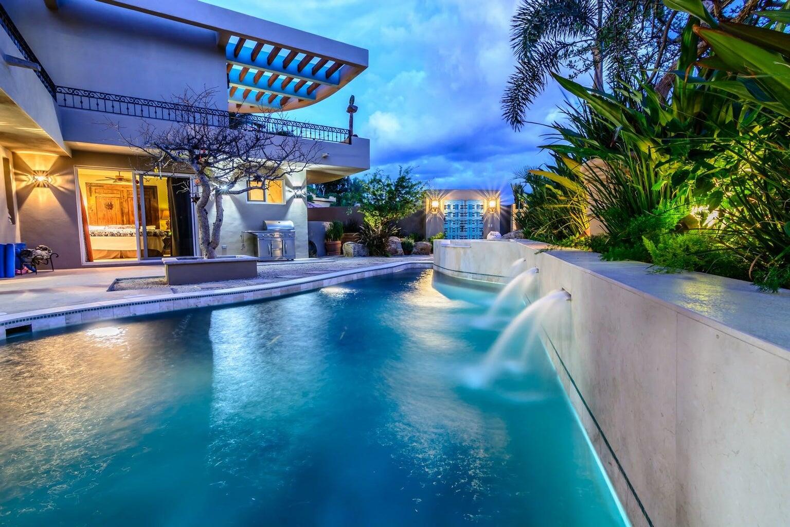 Cabo Luxury Pedregal Csl Tucked into the lush mountains of Pedregal, this residence offers rare privacy, land value, and untapped potential. Its standout feature is the expansive green zone beside the pool--a true rarity in Pedregal, where landscaping and usable outdoor space significantly elevate long-term value. This alone positions the property as a compelling investment. The home includes four bedrooms with lock-out closets, two separate entrances, a chef's kitchen with GE Monogram appliances and an aqua granite island, plus essentials like a generator and storm shutters. Ocean, hillside, and lush garden for sale