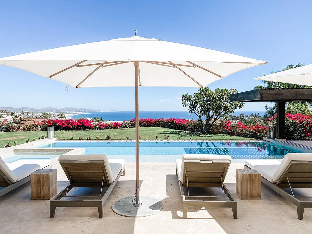Cabo Luxury Beach Estates Luz de Diamante is perfectly situated just a short walk from the beach and nestled within the prestigious Diamante community positioned between the 5th and 16th holes of the Dunes Course designed by Davis Love III. Spanning approximately 20,000 sqft, this magnificent residence, built in 2017, seamlessly blends modern design with Mexican accents. The estate boasts four spacious master bedrooms, each providing stunning ocean for sale