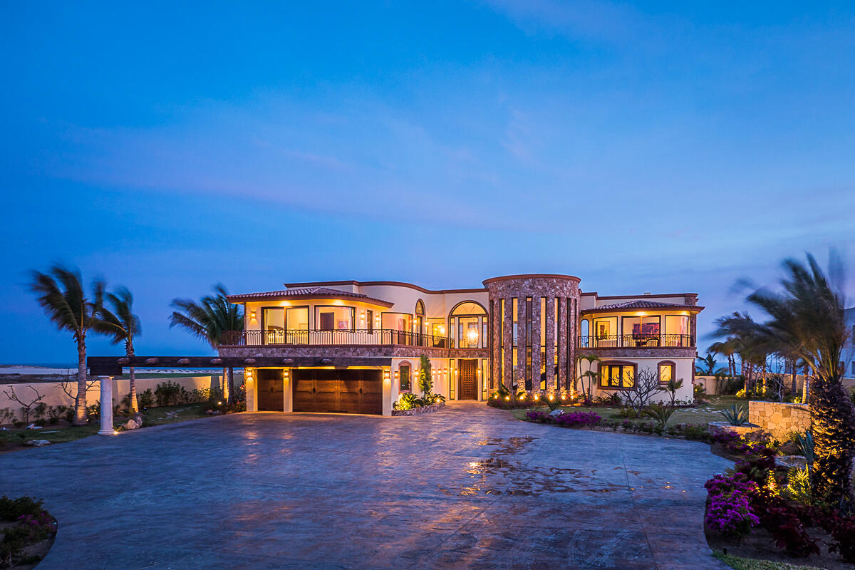 Cabo Luxury La Canada Experience unparalleled luxury in this exquisite modern residence, located in the prestigious Club Campestre Golf Club community of Los Cabos, Mexico. Boasting 5,242.02 sq. ft. of thoughtfully designed living space, this home offers four spacious bedrooms, each with its own en-suite bathroom, and two additional half-bathrooms for added convenience. High ceilings create an open, airy ambiance, while modern stone finishes and fine custom carpentry enhance the home's sophisticated aesthetic.The fully equipped kitchen is a culinary masterpiece, featuring state-of-the-art appliances from Sub-Zero, Wolf, and Bertazzoni. For added functionality, an additional working kitchen is included, making this home ideal for entertaining. From the interior, breathtaking ocean and golf course for sale