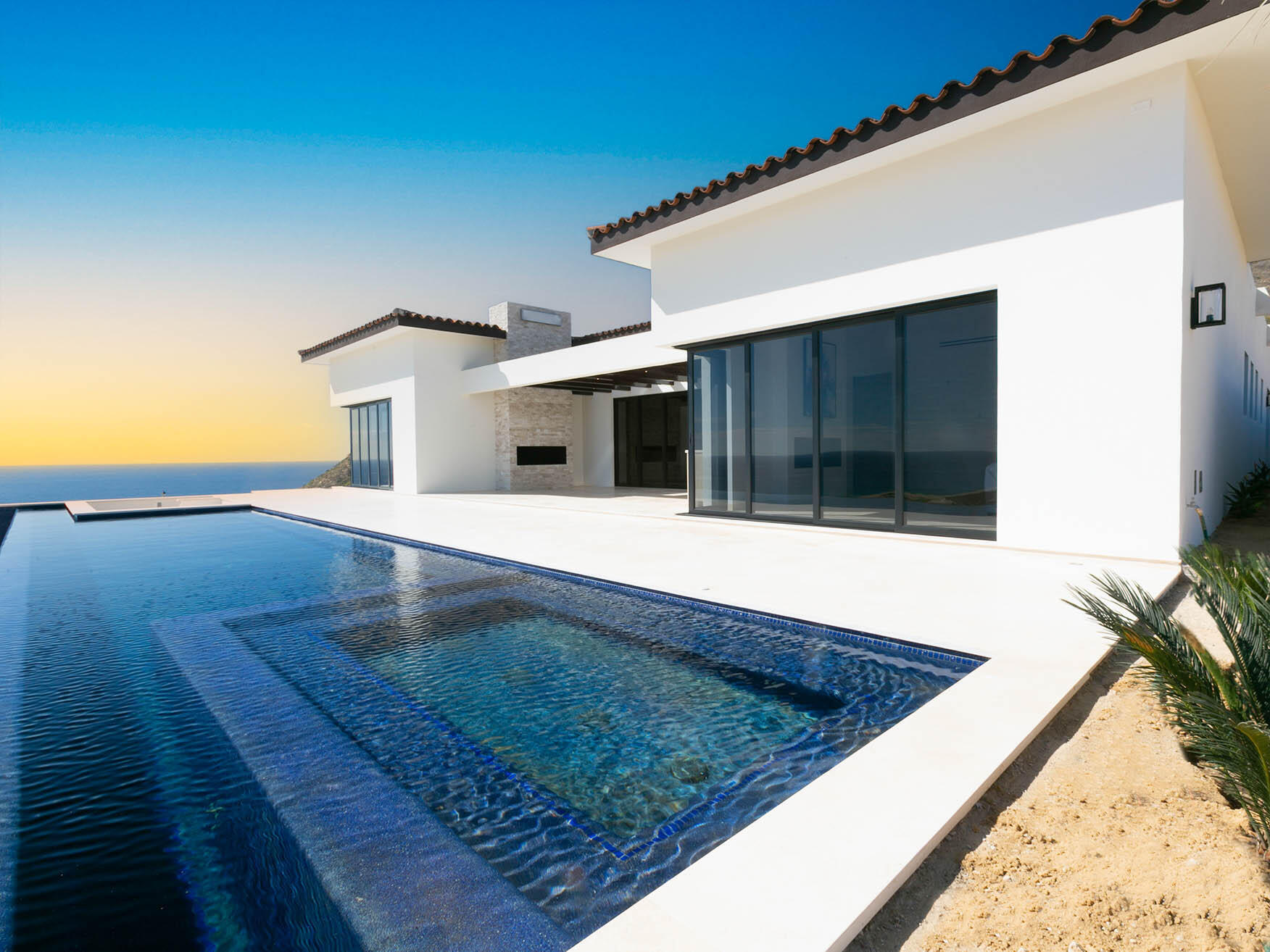 Cabo Luxury Copala Lot 40 is a stunning two-story residence featuring dual primary suites on the upper level, offering expansive Pacific Ocean for sale