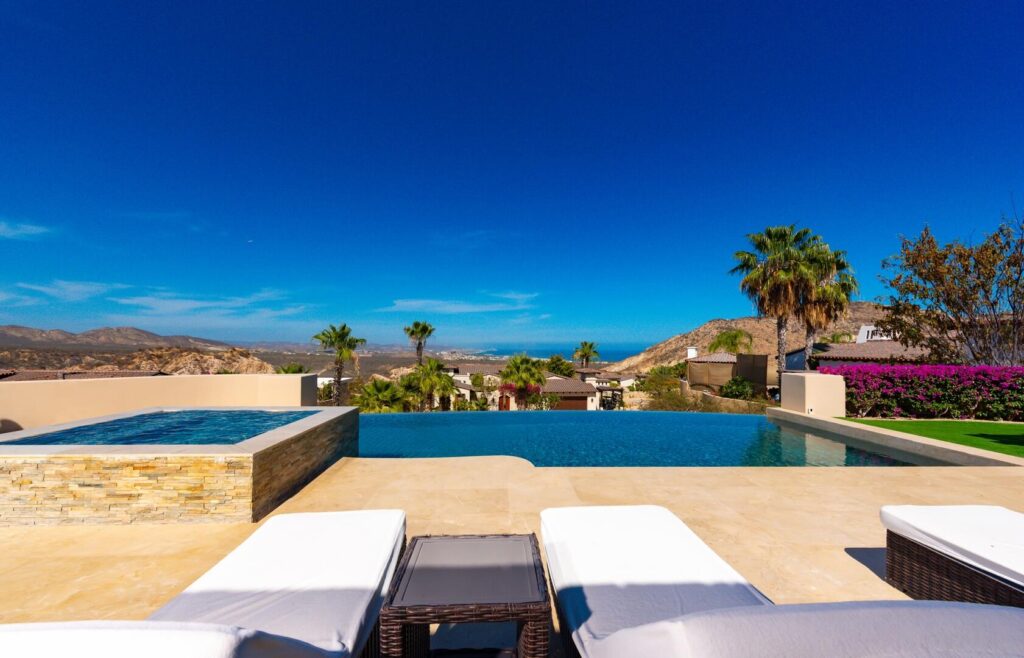 Cabo Luxury Section 4- Las Canadas Discover refined indoor-outdoor living at Cañada 9, set within Querencia, San Jose del Cabo's premier private golf community. Soaring beamed ceilings, walls of pocket glass, and luminous marble floors define an open great room that flows effortlessly to the terrace, infinity-edge pool, and stone-clad water feature -- all framed by panoramic Sea of Cortez and mountain – Querencia Blvd, San Jose Corridor, BS