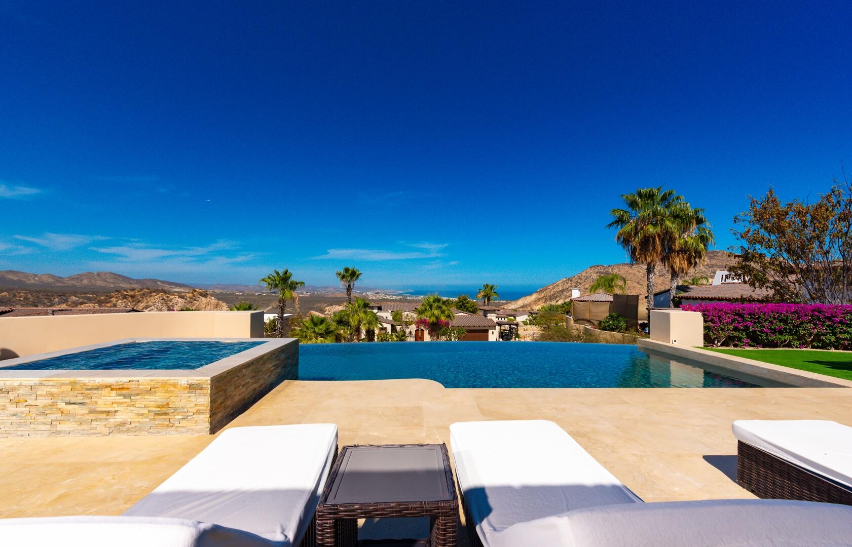 Cabo Luxury Section 4- Las Canadas Discover refined indoor-outdoor living at Cañada 9, set within Querencia, San Jose del Cabo's premier private golf community. Soaring beamed ceilings, walls of pocket glass, and luminous marble floors define an open great room that flows effortlessly to the terrace, infinity-edge pool, and stone-clad water feature -- all framed by panoramic Sea of Cortez and mountain for sale