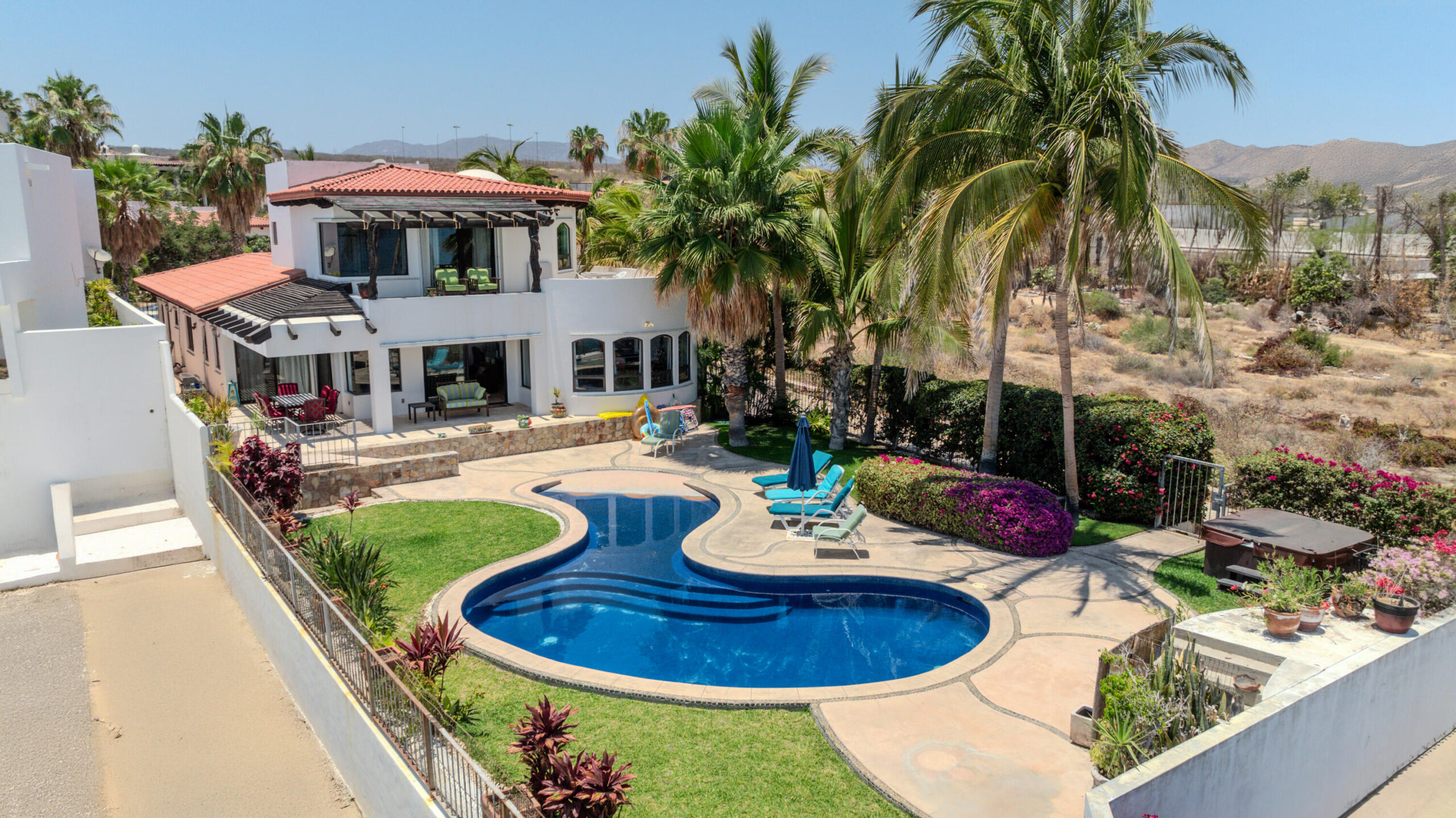 Cabo Luxury Playa Del Rey HUGE PROFT OPPORTUNITY to own the former cabo oasis of the red hot chili peppers (WATCH THE NEW NETFLIX DOC HERE cope and paste-(https://www.youtube.com/watch?v=Exs7-tOaQQY)---above a swimming/snorkel beach, currently generating a steady consistent income that outperforms others, due the former red hot chili pepper history and art. Hidden inside the double gated waterfront enclave above a a spanning beach and ocean cove, this aptly named estate awaits-just minutes to a long list of spoils. Covering nearly 6000 square feet, this triple-height foyer, opens into a grand spanning living and dining space layered in natural stone, marble and musical art throughout. Additional add-ons include: St Tropez themed exterior spaces, rooftop lounge, fire bowls and fire pits, added steam sauna and mor for sale