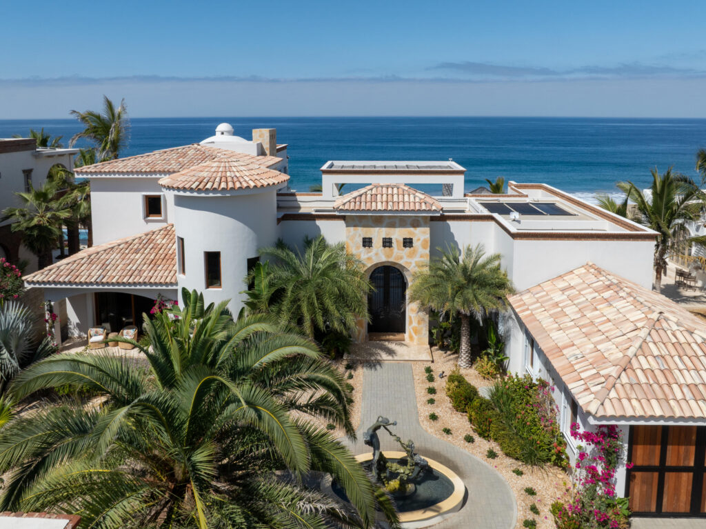 Cabo Luxury Rancho Nuevo This is a one of a kind estate property consisting of two oceanfront homes. The oceanfront estate with 3 grand bedrooms/4.5 baths, interior/exterior living, 2 kitchens, 2 dining areas, butler's pantry, 2 laundry rooms, and attached garage. Two primary suites are situated upstairs and downstairs.. No expense was spared in exquisite high end finish out such a brick bovedas, brick barrel kitchen ceiling, Heston appliances.Onyx countertops with hidden electrical outlets. This estate was built with the highest quality of materials and design. Dual pane hurricane doors and windows plus hurricane shutters encompassing even the covered patio. The orientation is perfectly situated to capture the Pacific, which sits on 3000m2 lot, walled with electronic gated car gate located high on a bluff. See mo Imagine only 35 minutes from Cabo San Lucas and 15 minutes from Todos Santos, lies the oceanfront gated community known as Rancho Nuevo. This one of a kind estate property consists of an oceanfront home with 3 oversized suites all with luxurious en suite bathrooms, walk-in closets, of which two are oceanfront. The upstairs primary has two terraces, one with built in seating compete with a fire pit. The home was constructed with the highest quality materials and orientation to take in the ocean – Villa Encanto, Palmilla Cove 5, San Jose Corridor, San Jose Corridor, BS