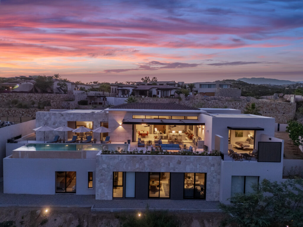 Cabo Luxury Section 18- Horizontes Welcome to Horizontes 3, an exquisite custom-made home located within San José del Cabo's most sought-after community, Querencia. Surrounded by Tom Fazio's signature golf course, recognized as one of the best in the country, this stunning residence is just a short golf cart ride from the prestigious 5-star Club House. This remarkable 6-bedroom, 6.5-bathroom home elevates luxury living with a fresh vision of architecture and design. The layout features a cozy family room, an expansive bunk bed bedroom on the lower level, and a spacious maid's quarters with an independent entrance, making it ideal for entertaining family and friends.The property boasts outdoor living spaces, including tranquil green areas, an outdoor kitchen, an infinity pool, a jacuzzi, and ocean and ravine – Contigo Cerritos Villa B1, Pacific, BS